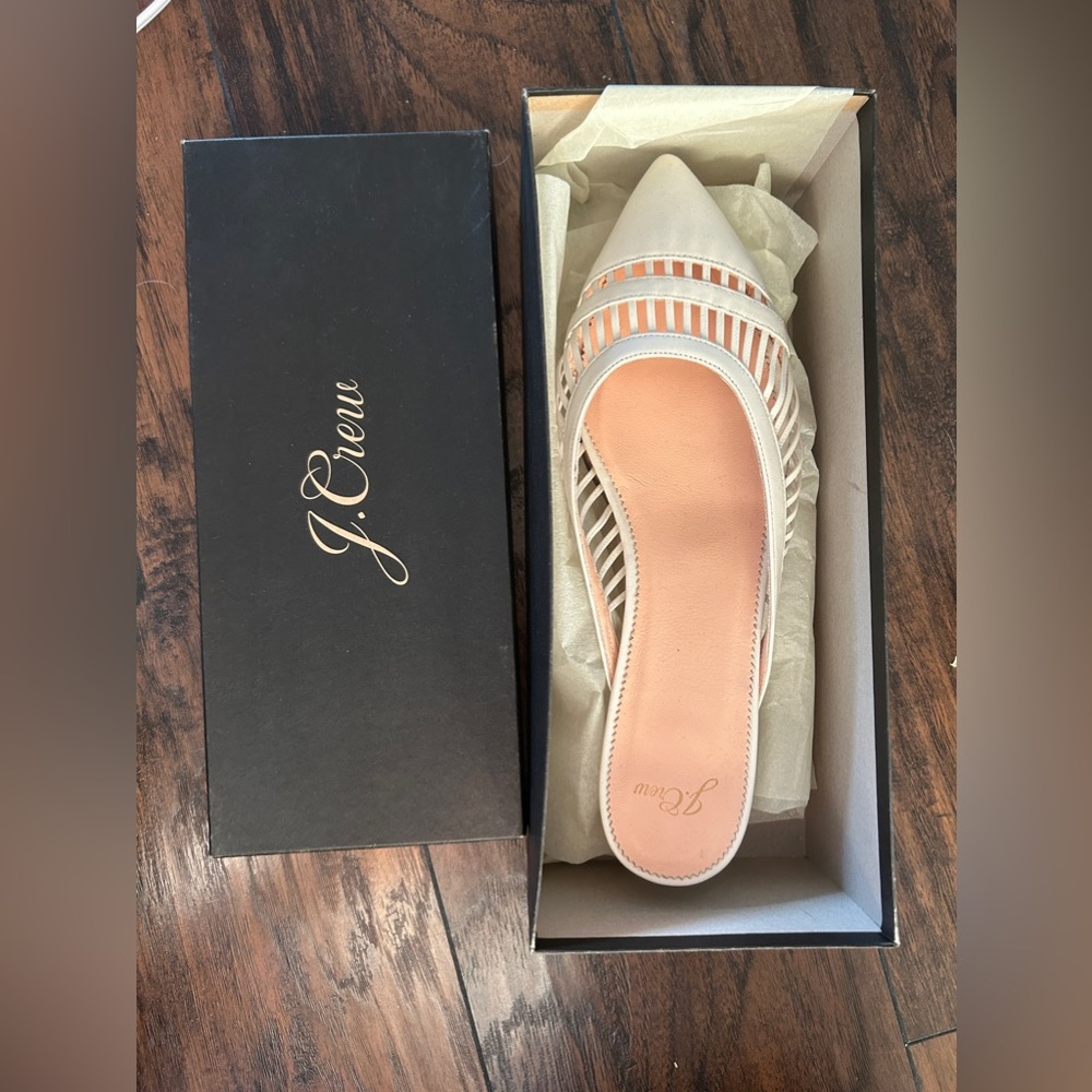 Never worn, in box leather cream mule